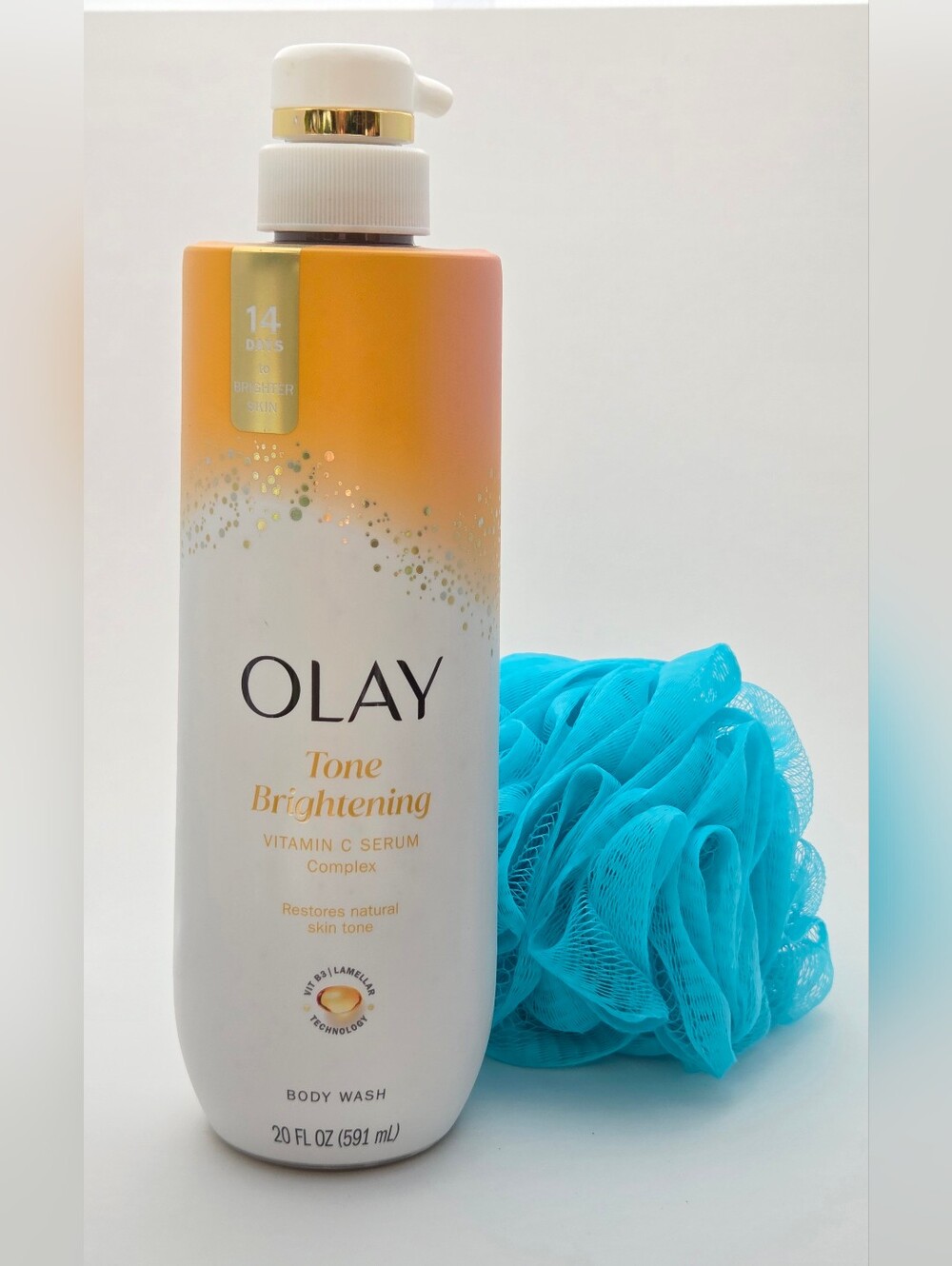 $10 When Bundled with $5+ Olay Tone Brightening Body Wash & Pouf Set